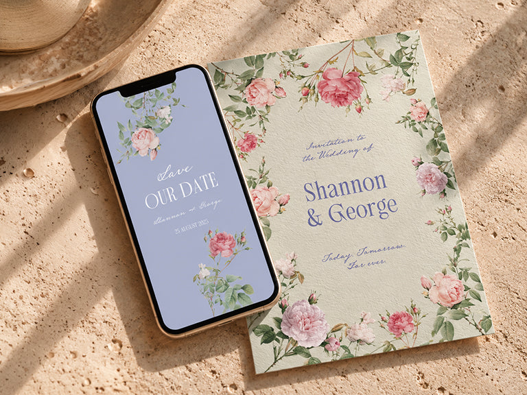 Smartphone showing a digital save the date next to a matching printed wedding invitation with roses