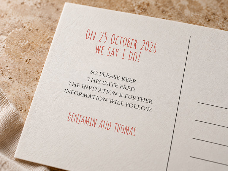 Back of a save the date postcard with sample wording asking guests to keep the date free